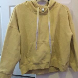 yellow sweatshirt